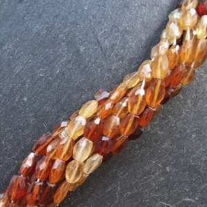 Hessonite Garnet Faceted Oval Beads 15" Strand