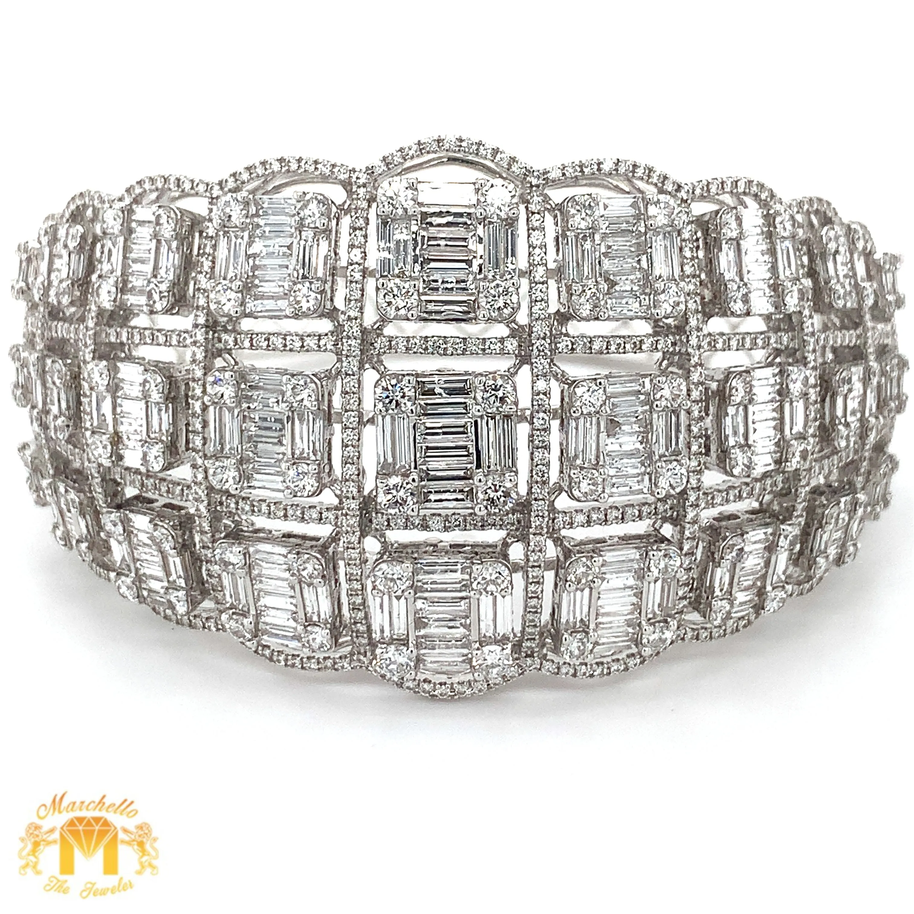 VVS/vs high clarity diamonds set in a 18k Gold Cleopatra Bangle Bracelet with Baguette and Round Diamonds